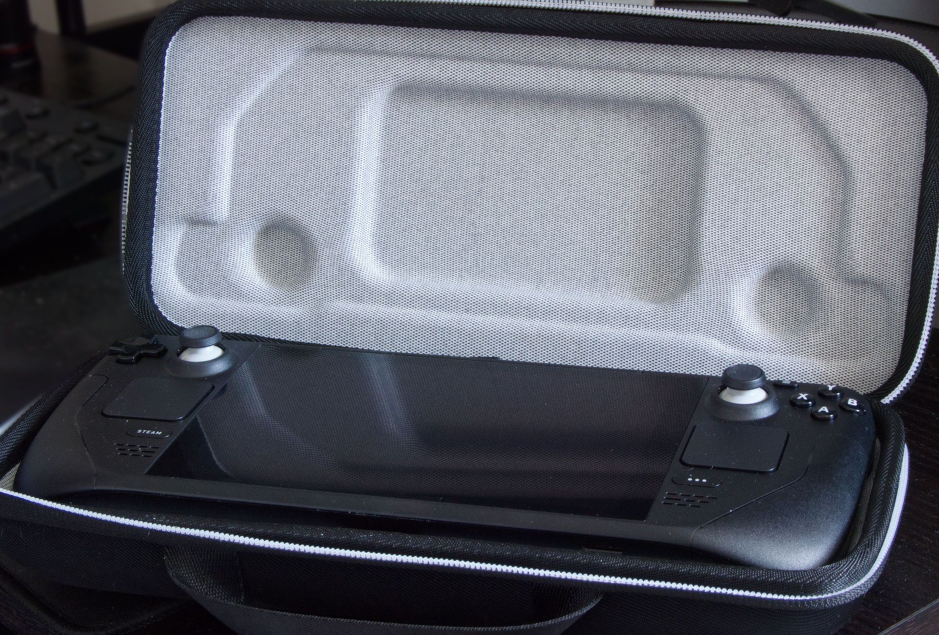 The Steam Deck in the carry case that comes with the top-specced variant